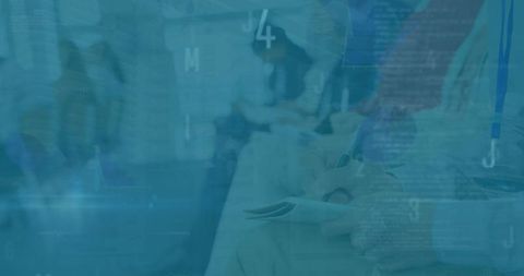 Businessman taking notes with data graphics overlay