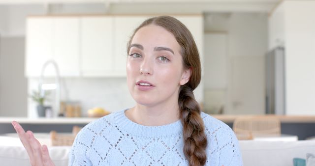 Woman with Braided Hair Discussing and Gesturing at Home - Download Free Stock Images Pikwizard.com