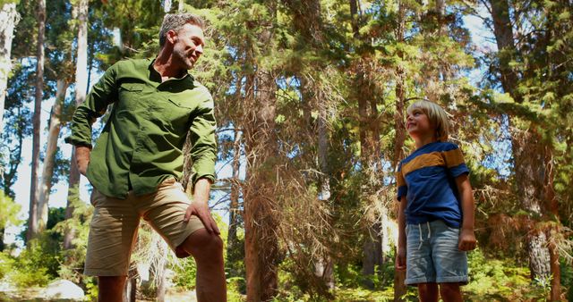 Father and Son Enjoying Outdoor Adventure in Forest - Download Free Stock Images Pikwizard.com