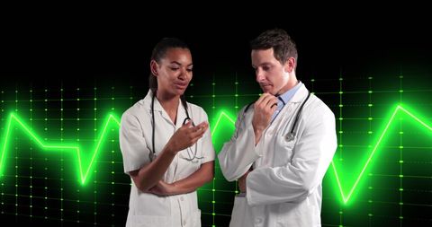 Diversified Medical Professionals with ECG Background - Download Free Stock Images Pikwizard.com