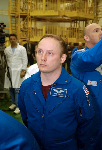Expedition 9 Science Officer and Flight Engineer Mike Fincke waits as his crew prepares to do their final Soyuz fit check at building 254 at the Baikonur Cosmodrome, Wednesday, April 14, 2004, in Baikonur, Kazakhstan.  Photo Credit: (NASA/Bill Ingalls)