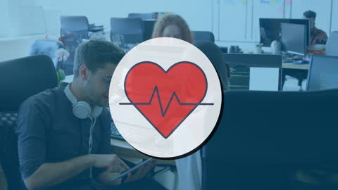 Heart Icon Overlay on Office Team Interaction