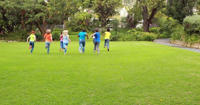 Children Running on Grass in Park - Download Free Stock Images Pikwizard.com