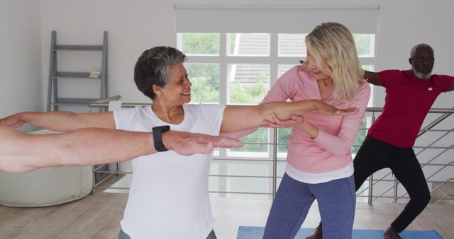 Group Practicing Yoga with Instructor in Bright Room - Download Free Stock Images Pikwizard.com