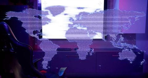 Futuristic holographic world map projecting over neon workstation with gaming chair, monitor
