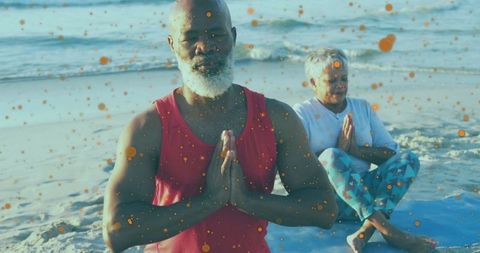 Couple Meditating in Deep Relaxation by Seashore with Spiritual Energy