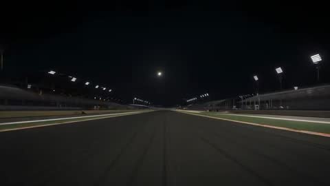 Quiet Nightfall on Classic Racetrack with Brightly Lit Stands