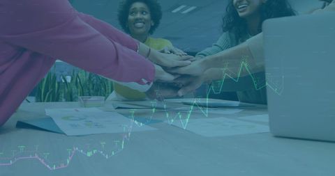 Diverse Team Collaboration with Financial Data Overlay in Office Setting