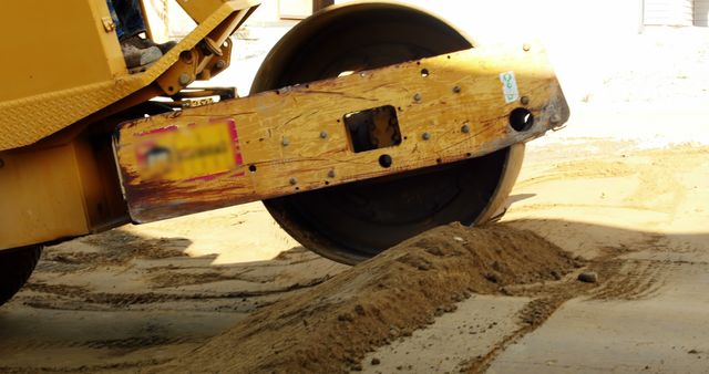 Construction Equipment Compressing Soil on Worksite - Download Free Stock Images Pikwizard.com