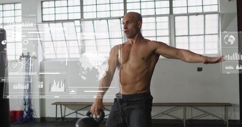 Shirtless athlete performing kettlebell swing in industrial gym with digital hud overlays
