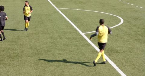 Soccer Players on Field Preparing for Corner Kick