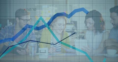 Business Team Analyzing Digital Data with Overlapping Graphs