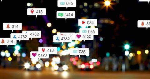Social Media Interaction Icons in Vibrant Urban Nightscape