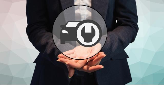 Businessperson holds a black icon of a car with a wrench in hands. Represents automobile service, automotive maintenance, and mechanical repair industry. Useful for car repair shops advertisements, professional mechanics promotions, business presentations relating to automobile services.