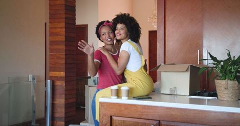 Harmonious Moment: Couple Enjoying New Home Enthusiastically