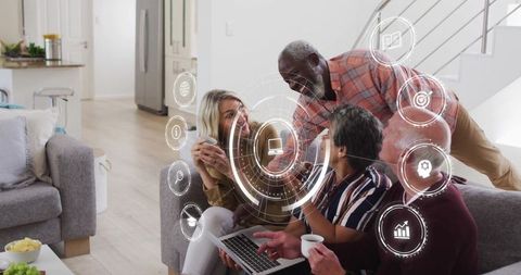 Senior group enjoying technology in modern living room
