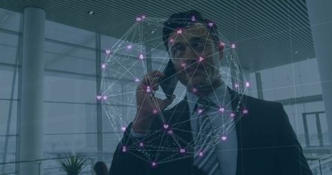 Businessman Engaged in Smartphone Call with Global Network Overlay