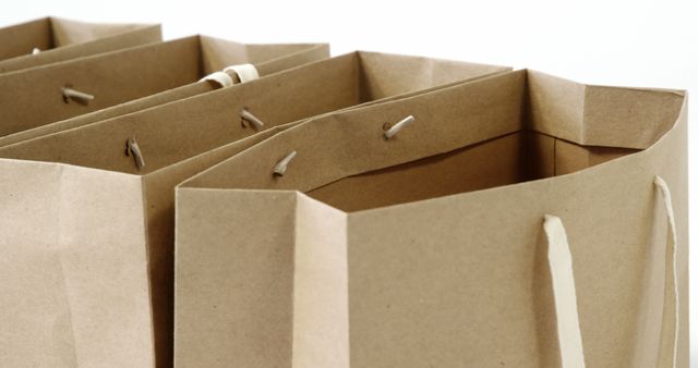 Close-Up of Eco-Friendly Paper Shopping Bags in Natural Brown Color - Download Free Stock Images Pikwizard.com