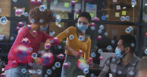 Office workers greeting with elbow bump amidst virtual covid-19 indicators