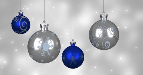 Elegant Holiday Ornaments on Glittering Background