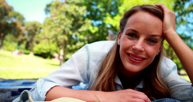 Young Woman Relaxing Outdoors on Sunny Day - Download Free Stock Images Pikwizard.com