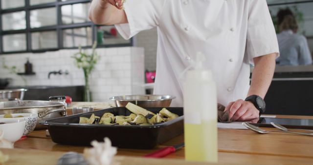 Professional Chef Prepares Vegetables in Modern Kitchen Setting - Download Free Stock Images Pikwizard.com