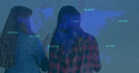 Women Analyzing Data with Holographic Map Interface