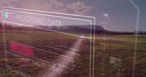 Futuristic HUD Overlay Showing Processing Data Progress Bar over Agricultural Farm Field