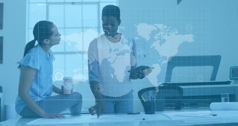 Professionals Analyzing Data with Modern Digital Interface in Office