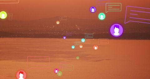 brightly colored communication icons float above a peaceful sunset over the sea, symbolizing global connections and social media networking. this concept is ideal for promoting digital communication services, demonstrating social media engagement strategies, or visualizing interconnectedness across digital platforms. use these visuals in marketing, educational content, or technology-related blogs.