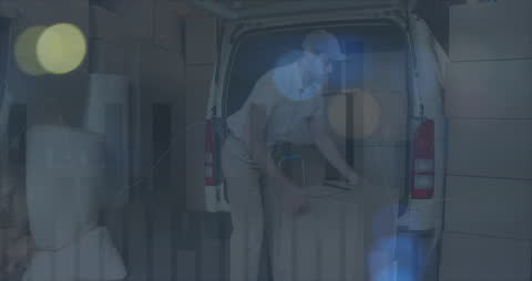 Delivery Worker Loading Van with Boxes and Digital Data Overlay