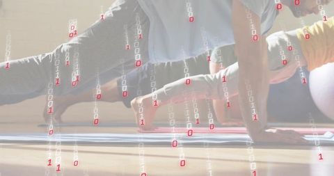 Planking partners building core strength with digital binary overlay in studio