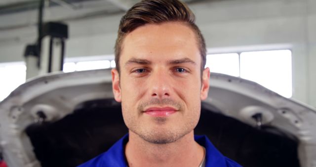 Confident Mechanic Standing in Auto Repair Shop - Download Free Stock Images Pikwizard.com