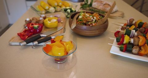 Rustic culinary preparation with fresh produce and skewers