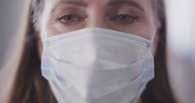 Close-Up of Woman Wearing Protective Face Mask - Download Free Stock Images Pikwizard.com