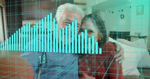 Senior couple embracing on sofa with teal data overlay symbolizing retirement finances