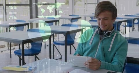 Teen Exploring Futuristic Digital Data in Classroom Setting