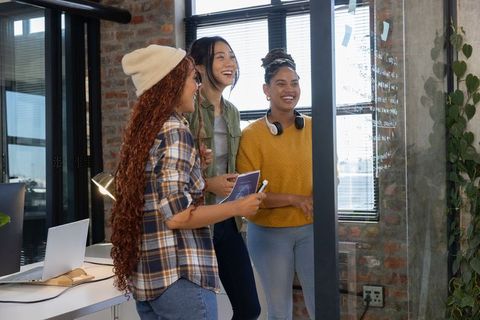 Diverse Team of Female Coworkers Collaborating