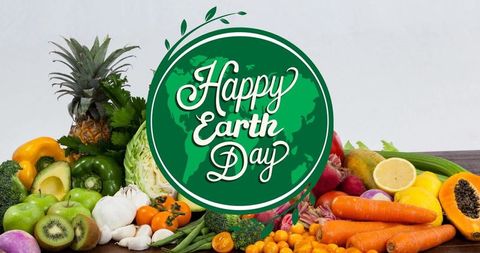 Happy Earth Day Over Fresh Vegetables and Fruits