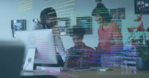 Software Team Reviewing Code on Desktop Monitor with Mobile Device and Transparent Code Overlay