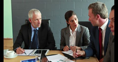 Team Discussion in Modern Office Environment