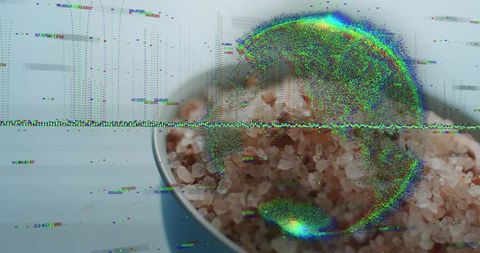 Blue bowl holding coarse pink himalayan salt with rgb glitch overlay and static distortion