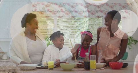 Family enjoying quality time cooking in bright kitchen