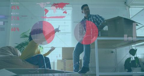 Colleagues Arranging New Workspace with Digital Data Overlays