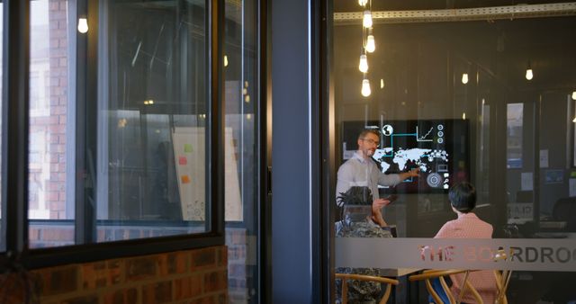 Business Meeting in Modern Glass-Walled Office Room - Download Free Stock Images Pikwizard.com