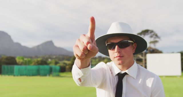 Cricket Umpire Making a Decision on Field - Download Free Stock Images Pikwizard.com