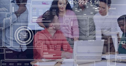 Business Team Reviewing Data with Augmented Reality Dashboards Around Laptop