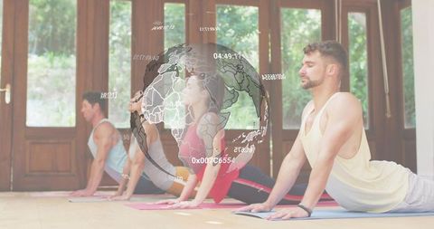 Group practicing upward-facing dog yoga with holographic globe for global wellness