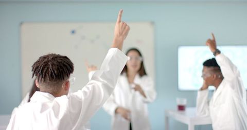 Diverse High School Students Engaging in Science Class Activity