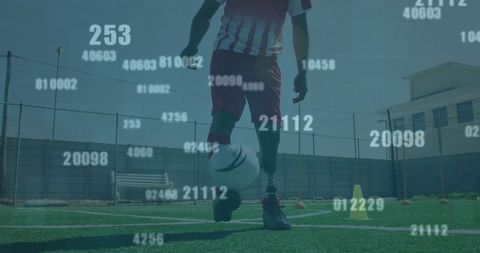 Soccer Player Dribbling With Digital Numbers Overlay